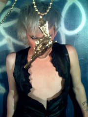 Justin Tranter and his XL Gun Necklace - $15